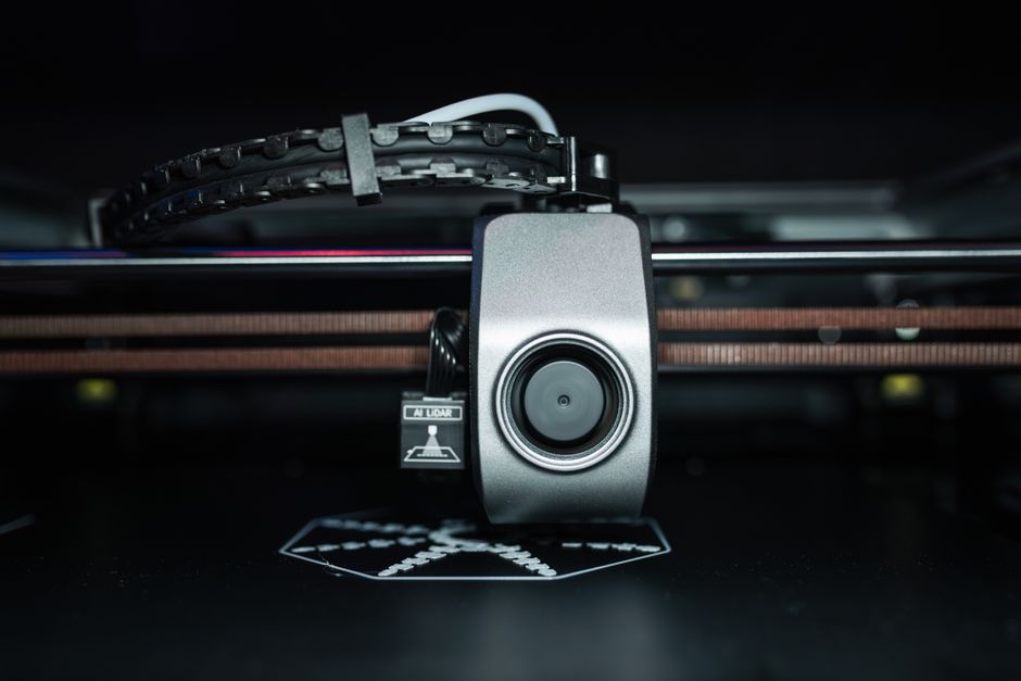 Elegoo Neptune 4 Pro high speed 3D printer printing a model.